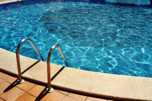 in-ground swimming pool with ladder