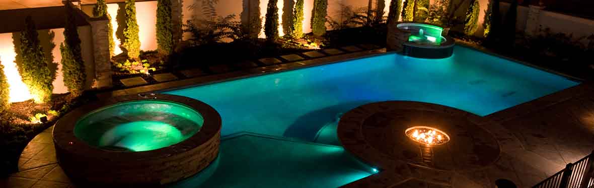 stunning in-ground pool at night