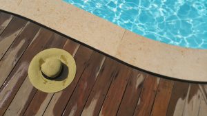 Hat on the edge of pool